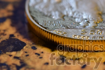 The photo shows a single coin, specifically a US quarter, with the image of George Washington on the front (also known as the obverse)