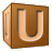 This animated GIF is a brown children's building block spinning, with the letter u on it