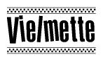 The image contains the text Vielmette in a bold, stylized font, with a checkered flag pattern bordering the top and bottom of the text.
