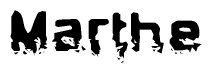 This nametag says Marthe, and has a static looking effect at the bottom of the words. The words are in a stylized font.