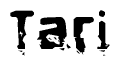 This nametag says Tari, and has a static looking effect at the bottom of the words. The words are in a stylized font.
