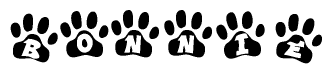 The image shows a series of animal paw prints arranged horizontally. Within each paw print, there's a letter; together they spell Bonnie