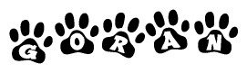 The image shows a row of animal paw prints, each containing a letter. The letters spell out the word Goran within the paw prints.