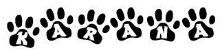 The image shows a row of animal paw prints, each containing a letter. The letters spell out the word Karana within the paw prints.