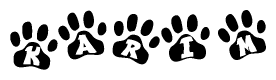 The image shows a series of animal paw prints arranged horizontally. Within each paw print, there's a letter; together they spell Karim