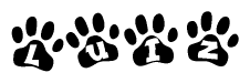 The image shows a series of animal paw prints arranged horizontally. Within each paw print, there's a letter; together they spell Luiz