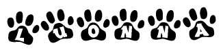 The image shows a row of animal paw prints, each containing a letter. The letters spell out the word Luonna within the paw prints.