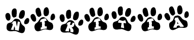 The image shows a series of animal paw prints arranged horizontally. Within each paw print, there's a letter; together they spell Nikitia