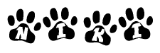 The image shows a series of animal paw prints arranged horizontally. Within each paw print, there's a letter; together they spell Niki