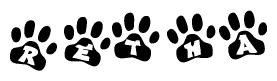 The image shows a series of animal paw prints arranged horizontally. Within each paw print, there's a letter; together they spell Retha
