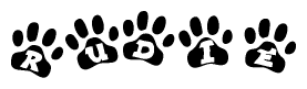 The image shows a row of animal paw prints, each containing a letter. The letters spell out the word Rudie within the paw prints.