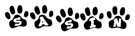 The image shows a series of animal paw prints arranged horizontally. Within each paw print, there's a letter; together they spell Sasin