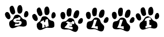 The image shows a series of animal paw prints arranged in a horizontal line. Each paw print contains a letter, and together they spell out the word Shelli.