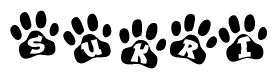 The image shows a series of animal paw prints arranged in a horizontal line. Each paw print contains a letter, and together they spell out the word Sukri.