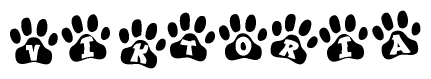 The image shows a series of animal paw prints arranged horizontally. Within each paw print, there's a letter; together they spell Viktoria