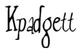 The image is a stylized text or script that reads 'Kpadgett' in a cursive or calligraphic font.
