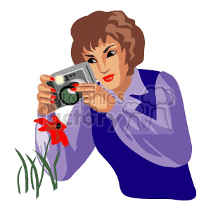A woman Photographer taking a Picture of a Red Flower
