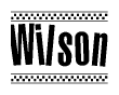 The clipart image displays the text Wilson in a bold, stylized font. It is enclosed in a rectangular border with a checkerboard pattern running below and above the text, similar to a finish line in racing. 