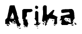 This nametag says Arika, and has a static looking effect at the bottom of the words. The words are in a stylized font.