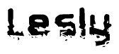This nametag says Lesly, and has a static looking effect at the bottom of the words. The words are in a stylized font.