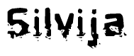   This nametag says Silvija, and has a static looking effect at the bottom of the words. The words are in a stylized font. 
