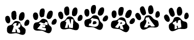 The image shows a series of animal paw prints arranged in a horizontal line. Each paw print contains a letter, and together they spell out the word Kendrah.