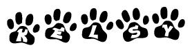 The image shows a series of animal paw prints arranged horizontally. Within each paw print, there's a letter; together they spell Kelsy