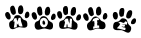 The image shows a row of animal paw prints, each containing a letter. The letters spell out the word Monie within the paw prints.