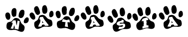 The image shows a series of animal paw prints arranged in a horizontal line. Each paw print contains a letter, and together they spell out the word Natasia.