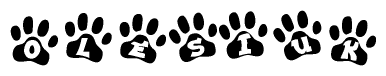 The image shows a series of animal paw prints arranged horizontally. Within each paw print, there's a letter; together they spell Olesiuk