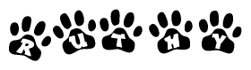The image shows a series of animal paw prints arranged horizontally. Within each paw print, there's a letter; together they spell Ruthy