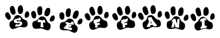 The image shows a series of animal paw prints arranged horizontally. Within each paw print, there's a letter; together they spell Steffani