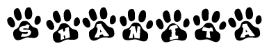 The image shows a series of animal paw prints arranged in a horizontal line. Each paw print contains a letter, and together they spell out the word Shanita.