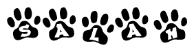 The image shows a row of animal paw prints, each containing a letter. The letters spell out the word Salah within the paw prints.