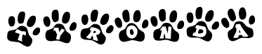 The image shows a row of animal paw prints, each containing a letter. The letters spell out the word Tyronda within the paw prints.