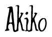 The image is a stylized text or script that reads 'Akiko' in a cursive or calligraphic font.