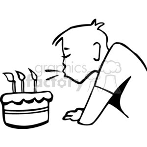 A little boy blowing out candles on a birthday cake