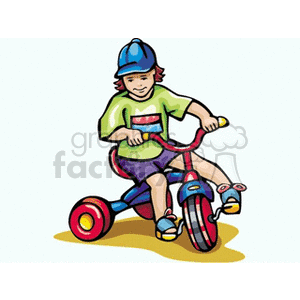 Little boy riding a tricycle