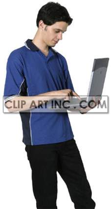 A man wearing a blue polo shirt, standing and using a laptop.