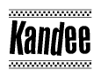 The image contains the text Kandee in a bold, stylized font, with a checkered flag pattern bordering the top and bottom of the text.