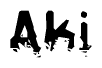 This nametag says Aki, and has a static looking effect at the bottom of the words. The words are in a stylized font.