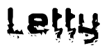 This nametag says Letty, and has a static looking effect at the bottom of the words. The words are in a stylized font.