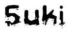 This nametag says Suki, and has a static looking effect at the bottom of the words. The words are in a stylized font.