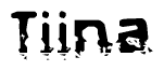 This nametag says Tiina, and has a static looking effect at the bottom of the words. The words are in a stylized font.