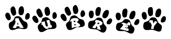 The image shows a series of animal paw prints arranged horizontally. Within each paw print, there's a letter; together they spell Aubrey