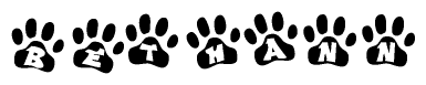 The image shows a series of animal paw prints arranged horizontally. Within each paw print, there's a letter; together they spell Bethann