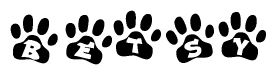 The image shows a series of animal paw prints arranged horizontally. Within each paw print, there's a letter; together they spell Betsy