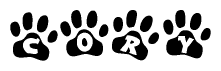 The image shows a series of animal paw prints arranged in a horizontal line. Each paw print contains a letter, and together they spell out the word Cory.