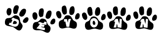 The image shows a series of animal paw prints arranged horizontally. Within each paw print, there's a letter; together they spell Devonn