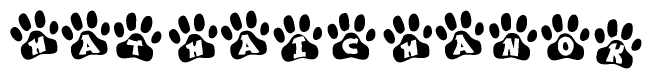 The image shows a series of animal paw prints arranged horizontally. Within each paw print, there's a letter; together they spell Hathaichanok